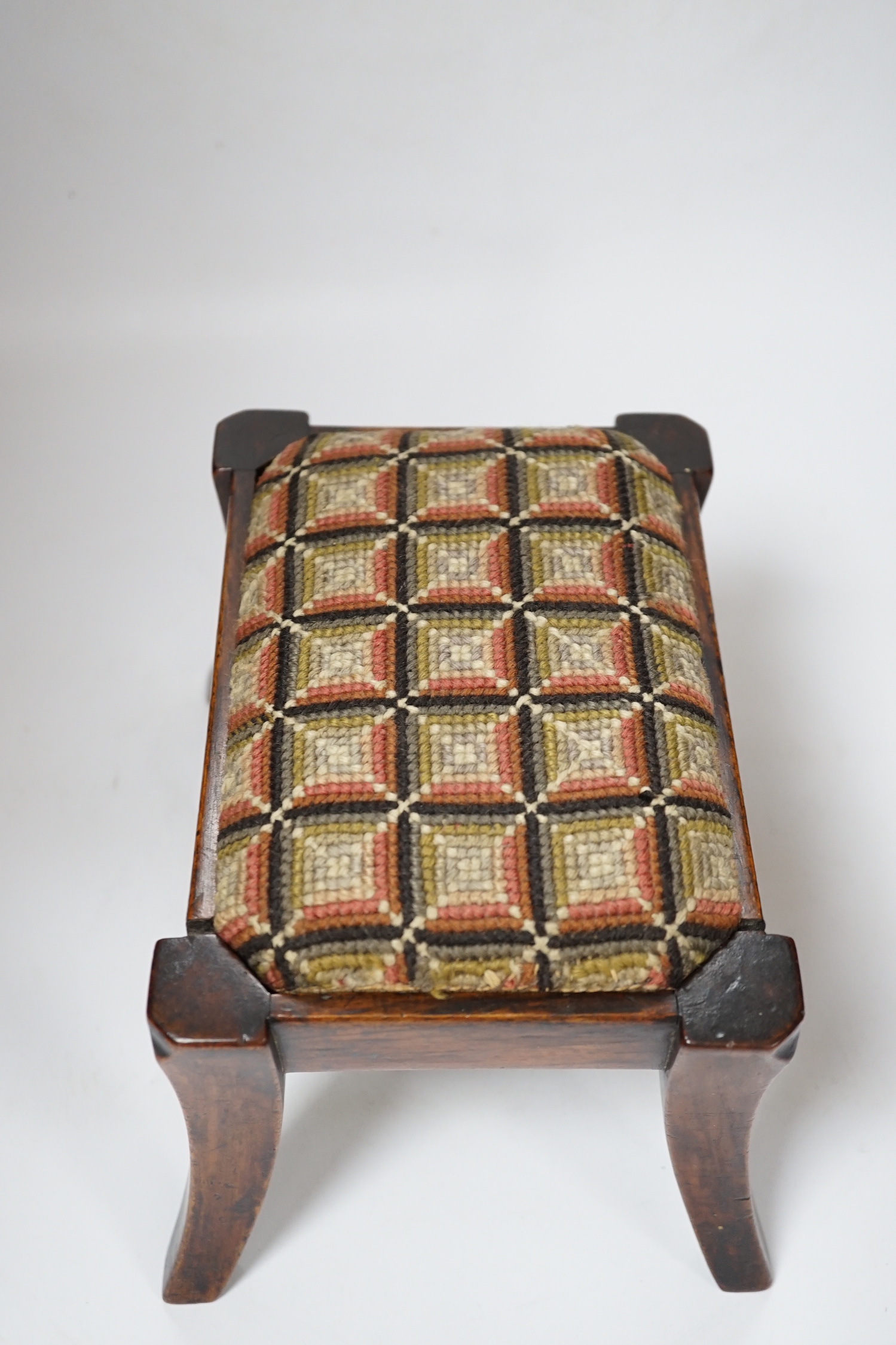 A 19th century walnut lacemaker's stool, 24cm wide